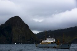 FILE - A Russian vessel is seen off the coast of the Southern Kuril island of Shikotan, Sept. 14, 2015. The Southern Kurils are referred to in Japan as the Northern Territories.