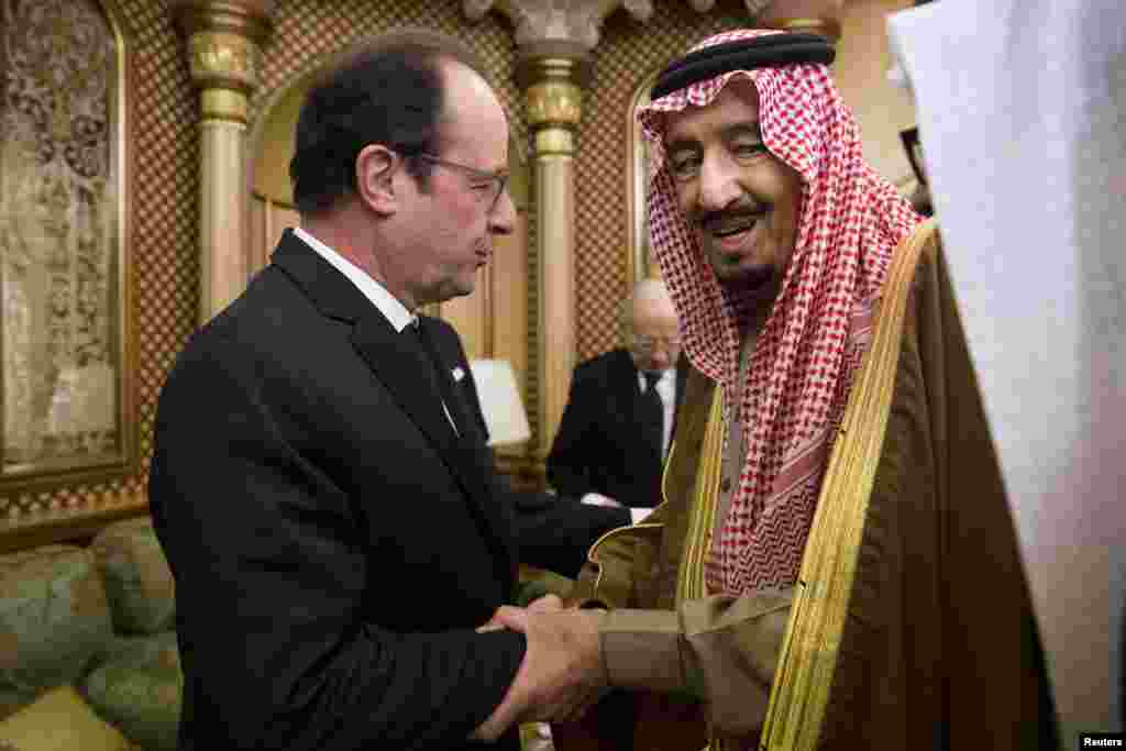 French President Francois Hollande offers condolences to Saudi King Salman following the death of Saudi King Abdullah, in Riyadh, Jan. 24, 2015.