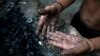 Venezuelans Seek Treasure in Polluted River 