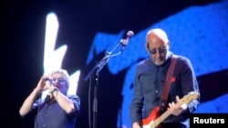 Guitarist Pete Townshend (R) and singer Roger Daltrey of British rock band The Who perform at the Azkena Rock Festival in Vitoria, Spain, June 18, 2016.