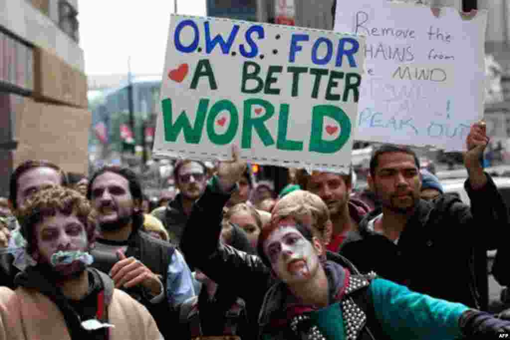 Protesters from Occupy Wall Street march through New York's financial district dressed as corporate zombies Monday, Oct. 3, 2011. The protests have gathered momentum and gained participants in recent days as news of mass arrests and a coordinated media ca
