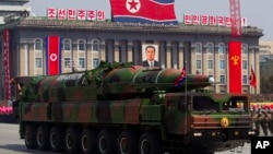 North Korean vehicle carrying a missile passes by during a mass military parade in Pyongyang's Kim Il Sung Square to celebrate the centenary of the birth of the late North Korean founder Kim Il Sung, April 15, 2012.