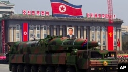 North Korean vehicle carrying a missile passes by during a mass military parade in Pyongyang's Kim Il Sung Square to celebrate the centenary of the birth of the late North Korean founder Kim Il Sung, April 15, 2012.