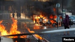 Los manifestantes participan en una protesta contra el gobierno de Chile en Viña del Mar, Chile, 23 de febrero de 2020.