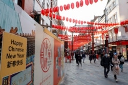 Preparations for Chinese Lunar New Year are seen in Chinatown, London, Feb. 11, 2021.