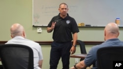 Christopher Day, a Border Patrol instructor and chaplain, directs a session at the Border Patrol Chaplain Academy, Nov. 20, 2024, in Dania Beach, Fla.