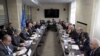 FILE - General view during a meeting between U.N. Syria envoy Staffan de Mistura and members of the Syrian interior opposition during Syria peace talks at the United Nations Office.