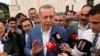 Turkish President Tayyip Erdogan talks to media after the Eid al-Fitr prayers to mark the end of the holy month of Ramadan in Istanbul, Turkey, June 4, 2019. 