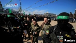 Four Israeli female soldiers, Naama Levy, Liri Albag, Daniella Gilboa and Karina Ariev, are released as part of a ceasefire and a hostages-prisoners swap deal between Hamas and Israel, in Gaza City