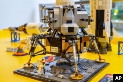 A Lego model of the Apollo 11 lunar lander is displayed in the company's store in New York on Tuesday, June 18, 2019.