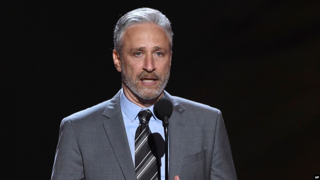 FILE- Jon Stewart presents the Pat Tillman award for service on July 18, 2018, at the ESPY Awards in Los Angeles. Stewart has been named the 23rd recipient of the Kennedy Center's Mark Twain Award for lifetime achievement in comedy. (Photo by Phil McCarten/Invision/AP, File)