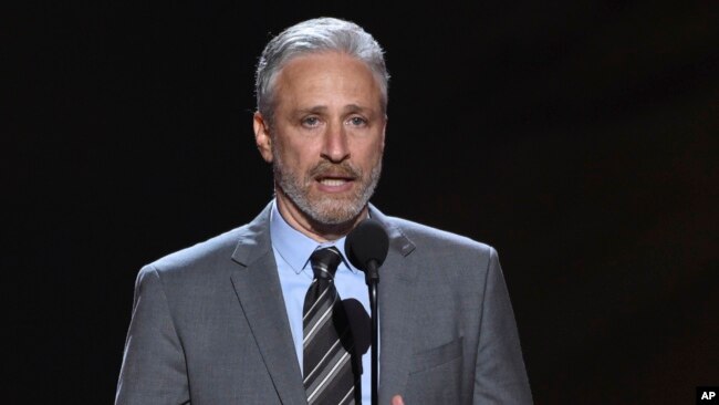 FILE- Jon Stewart presents the Pat Tillman award for service on July 18, 2018, at the ESPY Awards in Los Angeles. Stewart has been named the 23rd recipient of the Kennedy Center's Mark Twain Award for lifetime achievement in comedy. (Photo by Phil McCarten/Invision/AP, File)