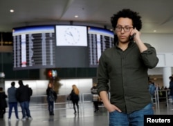 Mark Doss, Supervising Attorney for the International Refugee Assistance Project at the Urban Justice Center speaks on his cell phone at John F. Kennedy International Airport in Queens, New York, Jan. 28, 2017. Lawyers have reportedly already taken legal action against President Donald Trump's immigration order.