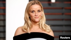 FILE - Actress Reese Witherspoon arrives at the 2015 Vanity Fair Oscar Party in Beverly Hills, California.