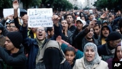 Anti-government protesters shout during a rally organized by the 20th February, the Moroccan Arab Spring movement in Casablanca, Morocco, Nov 20, 2011, in a mass popular call to bring more democracy into this North African kingdom.