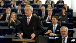 European Commission President Jean-Claude Juncker delivers his statement on growth, jobs and investment package for Europe, at the European Parliament in Strasbourg, France, Nov. 26, 2014.
