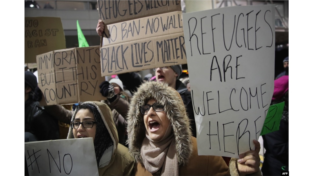 Demonstrators protest President Donald Trump's executive order which imposes a freeze on admitting refugees into the United States and a ban on travel from seven Muslim-majority countries at the international terminal at O'Hare Airport, Jan. 29, 2017 in Chicago, Illinois.