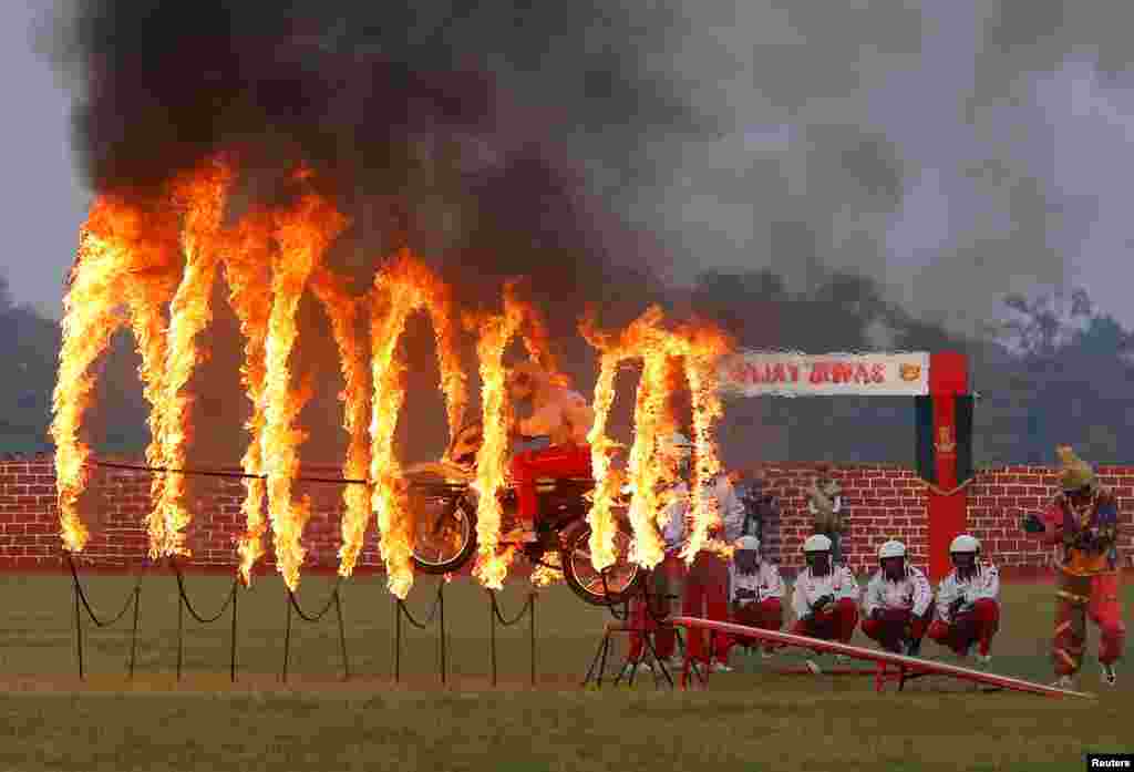 An Indian army soldier performs a stunt during celebrations ahead of the &#39;Vijay Diwas,&#39; a ceremony to celebrate the&nbsp;Dec. 16, 1971 liberation of Bangladesh by the Indian Armed Forces, in Kolkata, India.