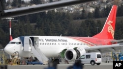 A brand-new Shenzhen Airlines Boeing 737 Max 8 airplane sits parked at Boeing Field, March 14, 2019, in Seattle. The fatal crash Sunday of a 737 Max 8 operated by Ethiopian Airlines was the second fatal flight for the model in less than six months.