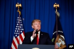 President Donald Trump speaks after the U.S. fired a barrage of cruise missiles into Syria Thursday night in retaliation for this week's gruesome chemical weapons attack against civilians, at Mar-a-Lago in Palm Beach, Fla., April 6, 2017.