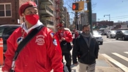Chris Carbonell (left), a team lead of the Guardian Angels squad in Queens. (Photo by Janine Phakdeetham)