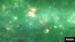 Researchers have identified a new spine-like structure of our Milky Way galaxy - a long, dense tendril of dust and gas. Credit: NASA/JPL/SSC