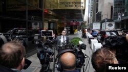 Plaintiff's lawyer Benjamin Dictor speaks to the media outside Trump Tower on the day that former U.S. President Donald Trump was deposed in the Manhattan borough of New York City, New York, October 18, 2021. 