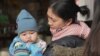 چینی حاملہ خاتون کی مشکل، دوسرا بچہ یا شوہر کی نوکری 