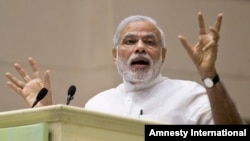 FILE - India’s Prime Minister Narendra Modi speaks during a conference by The Environment Ministry in New Delhi, India, April 6, 2015. 