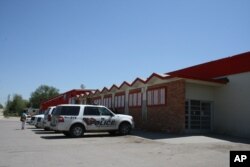 Photo shows the Sioux Nation Shopping Center in Pine Ridge, S.D., the sole grocery store on the Pine Ridge Indian Reservation.