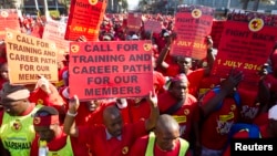 FILE - Members of the National Union of Metal Workers of South Africa (NUMSA) protest on the streets of Durban, July 1, 2014. 