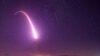 FILE - This image taken with a slow shutter speed on Oct. 2, 2019, and provided by the U.S. Air Force shows an unarmed Minuteman 3 intercontinental ballistic missile test launch at Vandenberg Air Force Base, Calif. 