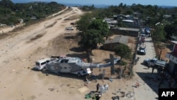 Vue aérienne de l'hélicoptère militaire qui est tombé sur une camionnette à Santiago Jamiltepec, État d'Oaxaca, au Mexique, le 17 février 2018.