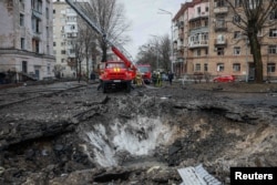 Місце падіння російської ракети у Києві, 21 березня 2024. REUTERS/Alina Smutko