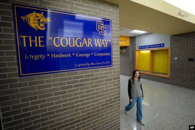 Makenzie Gilkison walks down the hallway at Greenfield Central High School, Tuesday, December 17, 2024, in Greenfield, Indiana.