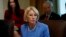 FILE - Education Secretary Betsy DeVos listens during a Cabinet meeting in the Cabinet Room of the White House in Washington, July 16, 2019. 