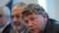 FILE - Eric Lander takes part during a news conference in Mexico City, next to Mexican billionaire Carlos Slim, on Jan. 19, 2010.