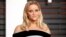 FILE - Actress Reese Witherspoon arrives at the 2015 Vanity Fair Oscar Party in Beverly Hills, California.
