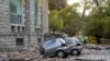 Damaged cars outside the Faculty of Geology building after an earthquake in Tirana, Sept. 21, 2019. Albania's government and news reports say an earthquake with a preliminary magnitude of 5.8 shook in the country's west and injured at least two people.