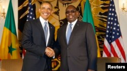 Presiden AS Barack Obama dan Presiden Senegal Macky Sall dalam konferensi pers bersama di Dakar, Kamis (27/6). 