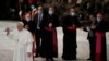 Pope Francis waves to faithful at the end of the weekly general audience in the Paul VI hall at the Vatican, Oct. 21, 2020.