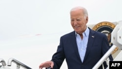 U.S. President Joe Biden steps off Air Force One upon arrival at Francis S. Gabreski Airport in Westhampton Beach, New York, on June 29, 2024.