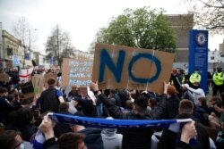 Chelsea fans protest the planned European Super League outside the stadium, in London, Britain, April 20, 2021.