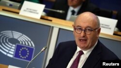 European Trade Commissioner-designate Phil Hogan of Ireland speaks as he attends his hearing before the European Parliament in Brussels, Belgium, Sept. 30, 2019. 