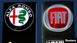 Logos of Alfa Romeo, Fiat, Jeep and Abarth are seen in Zurich