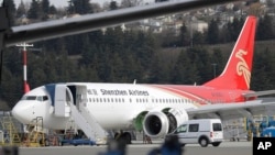 A brand-new Shenzhen Airlines Boeing 737 Max 8 airplane sits parked at Boeing Field, March 14, 2019, in Seattle. The fatal crash Sunday of a 737 Max 8 operated by Ethiopian Airlines was the second fatal flight for the model in less than six months.