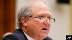 FILE - John F. Sopko, Special Inspector General for Afghanistan Reconstruction (SIGAR), testifies on Capitol Hill in Washington, June 10, 2014.