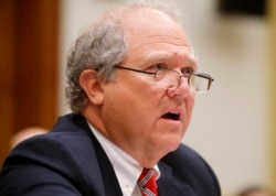 FILE - John Sopko, Special Inspector General for Afghanistan Reconstruction (SIGAR), testifies on Capitol Hill in Washington, June 10, 2014.