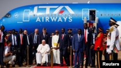 South Sudan's President Salva Kiir Mayardit receives Pope Francis at the Juba International Airport during his apostolic journey, in Juba, South Sudan, February 3, 2023.