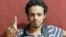 This undated and unlocated image shows French national Bilal Hadfi, 20, one of the suicide bombers who blew himself outside the Stade de France stadium during the Paris attacks on November 13. 